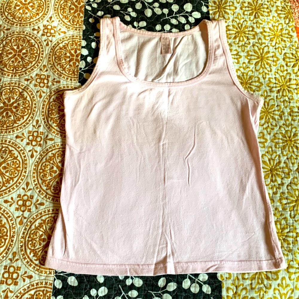 Pale pink tank top. Very soft. Great for layering.